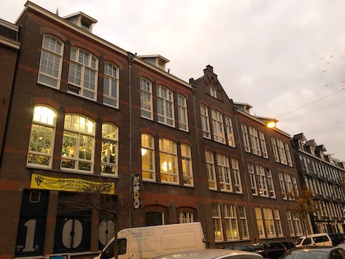 Walk through former squatters' building with vegetarian meal and obscure concert (Amsterdam, NL)